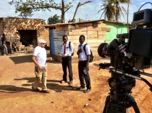 Director Garrett Batty coaches Clement Amegayie and Philip Michael as their characters prepare to flee Liberian Rebels. Freetown is a religious thriller coming to theaters April 8th, 2015. (Photo courtesy of Three Coin Productions)