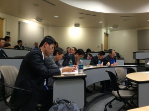 A panel of judges makes notes during a Chinese presentation at the Foreign Language Business Case Competition on Nov. 7. The judges are all native speakers and professionals in the business world. (Erica Palmer)