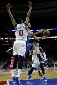 Brandon Davies defends the hoop in a recent Philadelphia 76ers game. (AP Photo/Matt Slocum)