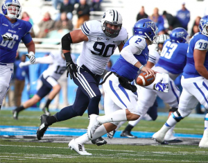 BYU linebacker Bronson Kaufusi chases quarterback Austin Grammer in Saturday's win against Middle Tennessee. (BYU Football Facebook photo)