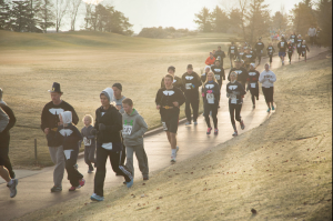 Runners in the Pilgrim 5K run the course at Thanksgiving Point. The course goes from the Garden Visitor's Center to the golf course, then loops back to the Garden Visitor's Center. (Alyssa Vincent)