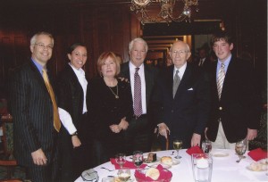John Hughes, his family and President Hinckley at a farewell dinner for Hughes' departure from Deseret News after a 10-year tenure. Pictured left to right: son Mark Hughes, daughter Jenny Slingerland, wife Peggy Hughes, John Hughes, President Gordon B. Hinckley, son Evan Hughes.