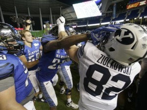 The brawl between BYU and Memphis after the Miami Beach Bowl. (AP Photo)
