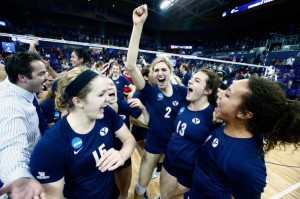 The BYU women's volleyball team celebrates its Elite Eight victory over Nebraska (BYU Photo)