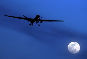FILE - In this Jan. 31, 2010 file photo, an unmanned U.S. Predator drone flies over Kandahar Air Field, southern Afghanistan on a moonlit night. Today, when U.S. intelligence agencies believe they know the location of a terrorist in Pakistan and a few other countries, they are largely free to deploy a weapon that's become the symbol of war on terror: an aerial drone. The drone drops a bomb or fires a missile that executes the suspect. University of Utah law professor Amos Guiora is pushing for another step before the U.S. government or military could decide to kill a terror suspect with a drone. In a proposal to be published in 2015, Guiora and a colleague are pushing for what they call a "drone court." The court would be part of the judiciary branch and hear arguments for why the United States should target a suspect with a drone strike. (AP Photo/Kirsty Wigglesworth, File)