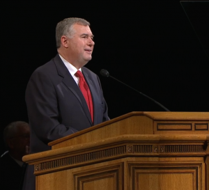Elder Erich W. Kopischke speaks at the University Devotional on Dec. 2. He addressed students about the importance of having clear vision set for their future. (BYUtv)