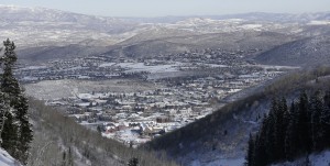FILE - This Nov. 23, 2013, file photo, shows Park City from a trail at the Park City Mountain Resort, in Park City, Utah. Buoyed by an improving economy and renewed buzz about Utah's ski scene thanks to Vail Resort's recent purchase of the state's largest resort, ski officials are expecting one of the best seasons in recent memory when lifts turn on later this month. Bookings at ski resorts are up about 4 percent from the same time last year, said Nathan Rafferty, president of the trade group Ski Utah. After two straight subpar years of snowfall, resorts are optimistic they're due for at least an average year. (AP Photo/Rick Bowmer, File)