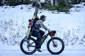 Mike Schneider riding his bike to the slopes to ride some back country powder. Schneider is the founder and president of Surface, who manufacture a wide range of skis. (Mike Schneider) 