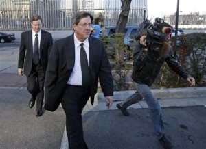 Nephi, left, and Lyle Jeffs leave the federal courthouse in Salt Lake City, Wednesday, Jan. 21, 2015. A federal judge says the brothers of polygamous sect leader Warren Jeffs can cite their religion in refusing to answer questions about suspected child labor violations on a Utah pecan farm. Nephi and Lyle Jeffs, who are considered high-ranking members of the secretive sect, testified that their church doctrine bars them from talking about the group's dealings. (AP Photo/Rick Bowmer)