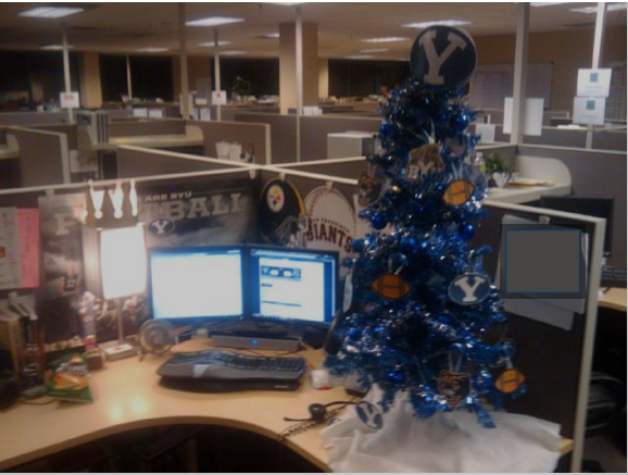Buea Graves brightens up his work cubical during the Christmas season with a little BYU spirit (photo Buea Graves).