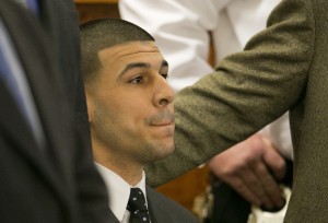 Former New England Patriots football player Aaron Hernandez listens as the guilty verdict is read during his murder trial, Wednesday, April 15, 2015, at Bristol County Superior Court in Fall River, Mass. Hernandez was found guilty of first-degree murder in the shooting death of Odin Lloyd in June 2013. He faces a mandatory sentence of life in prison without parole. (Dominick Reuter/Pool Photo via AP)
