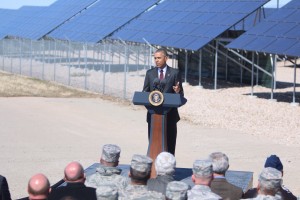 President Barack Obama stands in front solar panels as he announces solar power initiatives at the Hill Air Force Base in Utah. (Bryan Pearson)