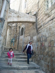 A Christian woman and her daughter walk through Old Jerusalem. Christian communities in the Middle East are threatened by the decline in religious freedom, according to a lecture given by Bernadito Auza. (Lucy Schouten)