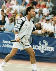 Brad Pearce reacts to a volley during a tennis match. Brad Pearce  is one of only sixteen Americans in last twenty-three years to reach the quarterfinals in singles at Wimbledon.