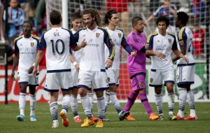 Real Salt Lake midfielder Kyle Beckerman and midfielder Luis Gil celebrate a win against the Chicago Fire. Real Salt Lake won 2-1. (AP Photo)