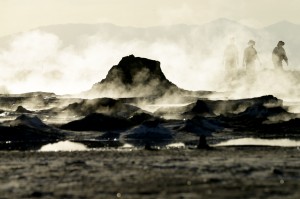 In this April 29, 2015, photo, steam rises from geothermal mud pots near the banks of the Salton Sea near Niland, Calif., evidence of the region's vast geothermal activity. Often called the "The Accidental Sea," because it was created when the Colorado River breached a dike in 1905, Salton Sea now faces a looming calamity as coastal Southern California clamors for more water. (AP Photo/Gregory Bull)