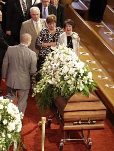 Mourners pay respects for L. Tom Perry, a member of The Church of Jesus Christ of Latter-day Saints' highest governing body, the Quorum of the Twelve Apostles, at the Salt Lake Tabernacle during a attend a public funeral Friday, June 5, 2015, in Salt Lake City. Perry died at the age of 92 from cancer. (AP Photo/Rick Bowmer)