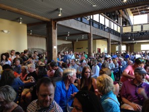 Community members and leaders crowd into the Park City lodge to see the new brand. Both skiers and snowboarders will be able to access all of the terrain at the Canyons and Park City this season.