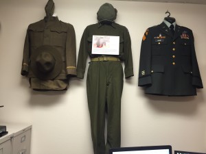 Dr. Vance Theodore has replicas of chaplain uniforms from 3 different wars displayed on a wall in his office. Theodore served in the military as a chaplain for over 25 years. (Jessilyn Gale)