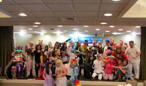 Attendees at last years My Little Pony Convention gather to take a picture. The male attendees are known as 'Bronies'.  