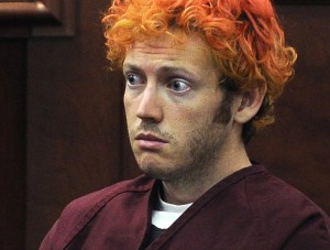 James Holmes, who is charged with killing 12 moviegoers and wounding 70 more in a shooting spree in a crowded theatre in 2012, sits in Arapahoe County District Court in Centennial, Colo. Jurors in the Colorado theater shooting trial reached a decision Monday, Aug. 3, 2015, on whether to keep the death penalty as an option for Holmes. The jury deliberated for less than three hours, starting Thursday after Holmes' parents made an emotional plea for their son's life because he is mentally ill. (RJ Sangosti/The Denver Post via AP, Pool, File)