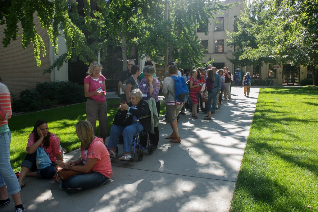 Education Week attendees gather outside the Joseph Smith Building to view a special preview of 'Meet the Mormons' that began showing in theaters October 2014. (BYU Universe)