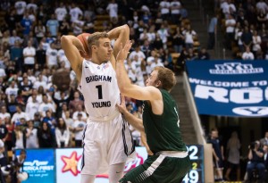 Chase Fischer looks to pass the ball at the game against Southern Virginia last November. Fischer is going to Spain with the Cougars to play four games in 10 days. (BYU Archives)