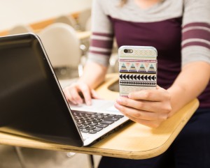 Many BYU students use both a phone and a laptop in class. Multitasking has become an increasing problem among students. (Maddi Dayton)