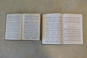 A brown 1948 hymnbook, left, sits next to the current edition. The 1948 hymnbook, revised as the 1950 hymnbook, was the starting point for compiling the current edition. (Natalie Bothwell)