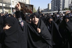 Iranian worshippers chant slogans while attending an anti-Saudi protest rally on Thursday, after their Friday prayer service in Tehran, Iran, Friday, Sept. 25, 2015. Thousands of Iranian worshippers have marched in Tehran after Friday prayers to denounce the "incompetency" of Saudi Arabia in handling the annual hajj pilgrimage. The protest came a day after at least 719 pilgrims died during a crush on the outskirts of the holy city of Mecca. (AP Photo/Vahid Salemi)