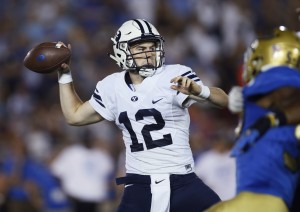 Tanner Mangum passes the ball in the one-point loss to UCLA. (Associated Press)