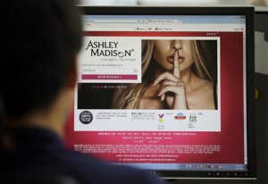 A June 10, 2015 file photo shows Ashley Madison's Korean web site on a computer screen in Seoul, South Korea. Contrary to the hacked Ashley Madison cheaters' site that offers anonymous opportunities for affairs, infidelity more often includes somebody a child actually knows: a family friend, a neighbor, a parent from Little League or the PTA, therapists and divorce attorneys said. That means the third party may become a permanent fixture in the lives of children going forward, forcing an entirely new context on young people as they attempt to sort out villains from victims. (AP Photo/Lee Jin-man, File)