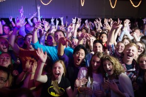 Students dance in tight crowds at BYU's Homecoming dance. This year, students have three dance options: casual, semi-formal and formal. The dance takes place on Friday, Oct. 9. (Elliott Miller)
