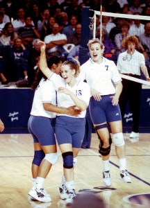 Whitted celebrates after a tough rally during a BYU game. Whitted was on the women's volleyball team from 1991-1994. (Photo courtesy from BYU women's volleyball dept.)