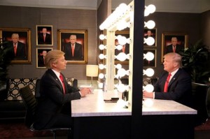 In this image released by NBC, host Jimmy Fallon, left, and Republican presidential candidate Donald Trump appear in the "Trump in the Mirror" skit during a taping of "The Tonight Show Starring Jimmy Fallon," on Friday, Sept. 11, 2015, in New York. (Douglas Gorenstein/NBC via AP)