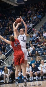 Former BYU athlete Jennifer Hamson shoots during a game against Gonzaga in 2014. Jennifer now plays for the Los Angeles Sparks and continues to represent BYU's tradition of spirit and honor.(Ari Davis)