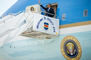 President Barack Obama waves as arrives on Air Force One at Des Moines International Airport in Des Moines, Iowa, Monday, Sept. 14, 2015. Obama is expected to officially announce a change to the college financial aid system. (Associated Press)