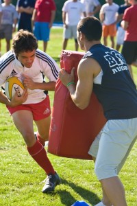 A BYU rugby player helps with tryouts from 2008. These tryouts are crucial to the team's success. (David Scott)