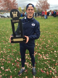 Team Captain Dylan Shawn holds the WCC Championship trophy.  The men's cross country team had seven runners in the top eight. (BYU T&F/CC Twitter account)