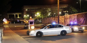A police car leaves the campus of Tennessee State University early Friday, Oct. 23, 2015, in Nashville, Tenn. Authorities say one person was killed and two others hospitalized in a shooting Thursday night at an outdoor courtyard. A campus spokesperson said the person killed wasn't enrolled at the school. (AP Photo/Mark Humphrey)