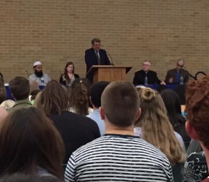 Brent Top addresses the Symposium. From left to right: Imam Shuaib-ud Din, BYU CrossSeekers President Amber Cazzell Nadal, Brent Top, Monsignor Francis Mannion, and Travis Kerns. (Renae Storms)