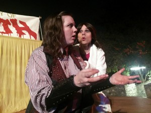  Lady Macbeth (Jordan Kramer) consoles Macbeth (Toria Truax) after he returns from the king's chamber with blood on his hands during the Grassroots Shakespeare Company's gender-swapped performance of Macbeth.