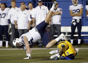 BYU's Remington Peck leaps over San Jose State cornerback Jimmy Pruitt after a catch in the Cougars' 17-16 win over San Jose State on Nov. 6, 2015. (AP Photo)