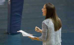 Head coach Heather Olmstead communicates to players on the court. Olmstead said both teams played scrappy in today's game against Pacific. (The Universe)