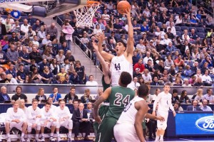 Corbin Kaufusi dunks the ball against Adams State. Kaufusi has been excellent for the Cougars this season. (Natalie Bothwell) 
