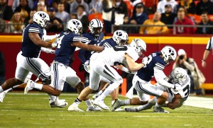The BYU Defense tackles Missouri's Russell Hansbrough for a loss. BYU lost to Missouri 16-24. (Mark Philbrick/BYU Photo)