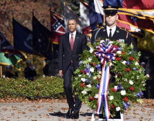 President Barack Obama arrives to lay a wreath at the Tomb of the Unknowns, Wednesday, Nov. 11, 2015, at Arlington National Cemetery in Arlington, Va. during Veterans Day ceremonies. (AP Photo/Susan Walsh)