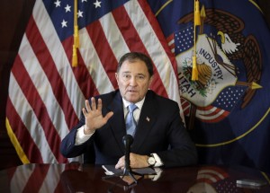 FILE - In this Feb. 5, 2015, file photo, Utah Gov. Gary Herbert speaks to reporters during a news conference at the Utah State Capitol in Salt Lake City. Herbert is ordering a review of security checks for refugees coming to Utah on the heels of the last week's attacks in Paris. The Republican governor said in a statement Monday, Nov. 16, 2015, that he wants state and federal authorities to reevaluate how they screen refugees. (AP Photo/Rick Bowmer, File)