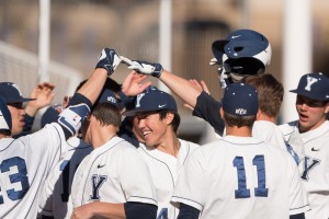 The BYU baseball team celebrates during a game last season. The team announced the signings of five recruits on Thursday. (Universe Archive)