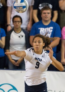 Alexa Gray serves volleyball from previous game. Gray was named WCC Player of the Week for fourth-consecutive week. (The Universe)